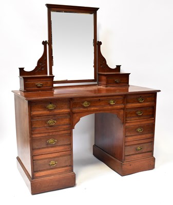 Lot 53 - An Edwardian mahogany nine-drawer kneehole...