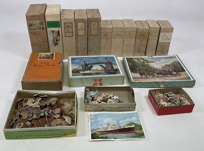 Lot 90 - A collection of vintage jigsaw puzzles in...