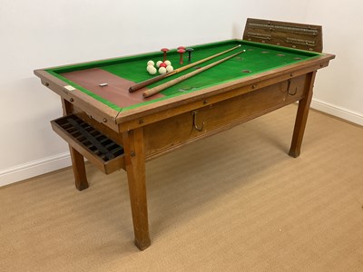 Lot 80 - A bar billiards table manufactured by John...