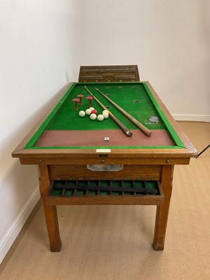 Lot 80 - A bar billiards table manufactured by John...