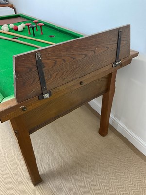 Lot 80 - A bar billiards table manufactured by John...