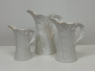 Lot 201 - ROYAL WORCESTER; a set of three Fern Leaf...