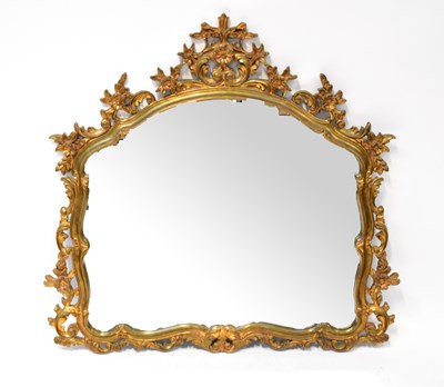 Lot 118 - A gilt framed wall mirror with arched top and...