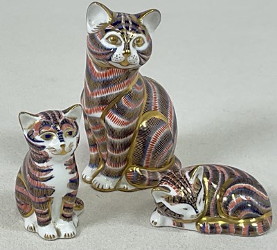 Lot 203 - ROYAL CROWN DERBY; three cat paperweights, two...