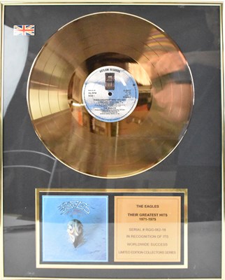 Lot 377 - THE EAGLES; a framed limited edition record,...