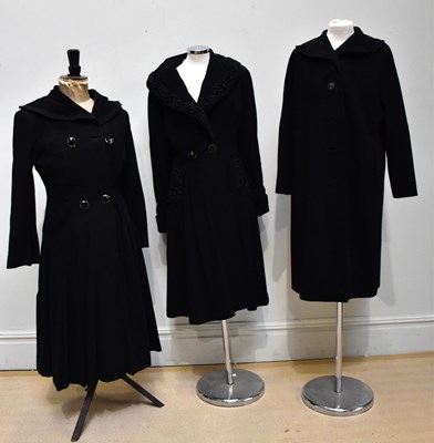 Lot 914 - E. BERG, LONDON; two circa 1940s black wool...