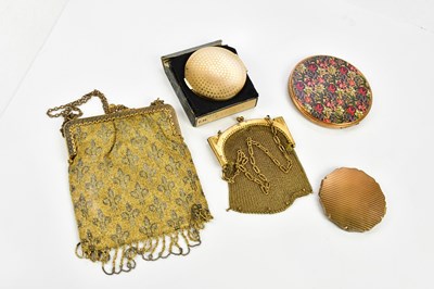 Lot 1509 - A group of three vintage compacts and two purses.