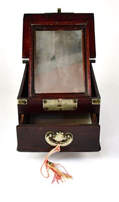 Lot 527 - A small Korean metal bound travelling vanity...