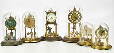 Lot 1335 - Six anniversary type mantel clocks in domes (6)