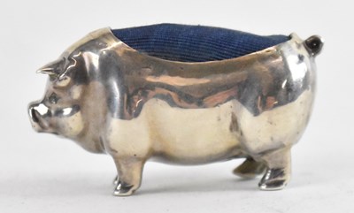 Lot 667 - A hallmarked silver pin cushion modelled as a...