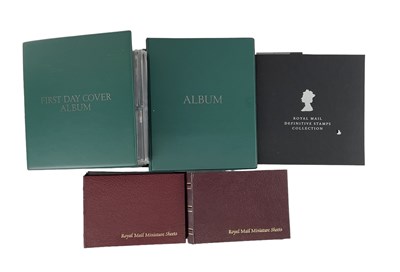 Lot 338 - Four albums of presentation packs, miniature...