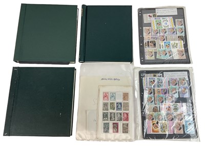 Lot 355 - Four albums of Queen Elizabeth II stamps...