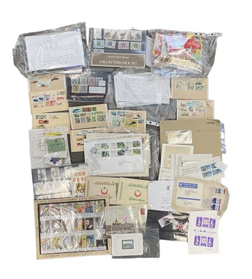 Lot 348 - A box of GB stamps, presentation packs, stamp...