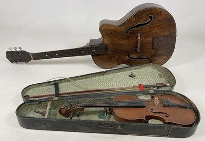 Lot 128 - An unattributed violin contained in a wooden...