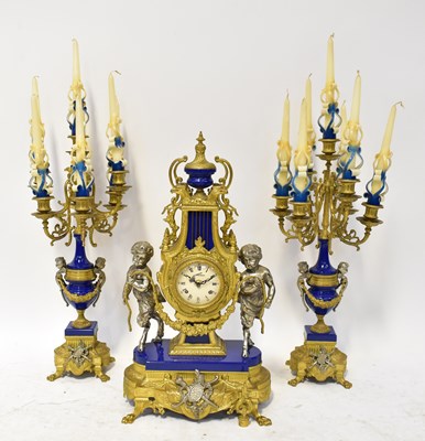 Lot 158 - An Empire-style gilt metal and blue painted...