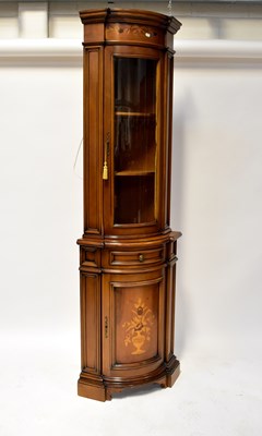 Lot 68 - An inlaid bow-fronted floor standing corner...