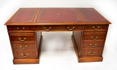 Lot 79 - A Georgian-style yew wood pedestal desk with...