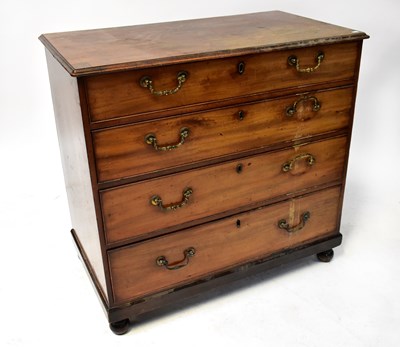 Lot 61 - A Georgian mahogany chest of four long...