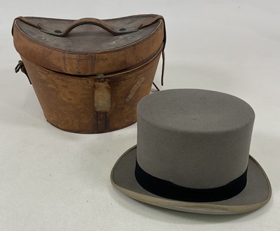 Lot 85 - TRESS & CO, LONDON; a grey felt top hat in a...