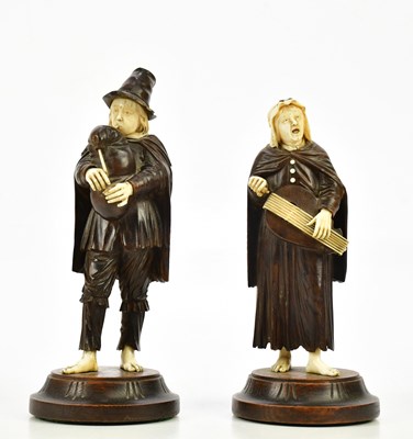 Lot 1379 - A pair of late 19th century German carved wood...