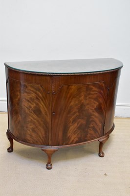 Lot 1057 - A mahogany demi-lune sideboard with single...