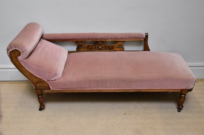 Lot 1025 - A late 19th/early 20th century carved walnut...