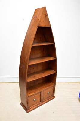 Lot 1175 - A modern hardwood bookcase with four fixed...