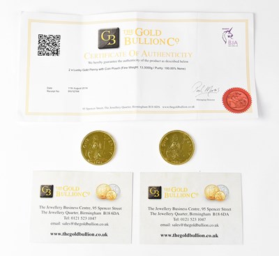 Lot 1038 - Two 24ct gold-plated one penny coins from 1964...