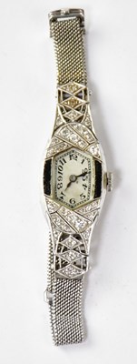 Lot 1349 - An Art Deco style diamond and black onyx...