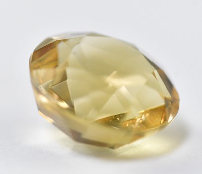 Lot 888 - A loose citrine stone, diameter 13.9mm, height...