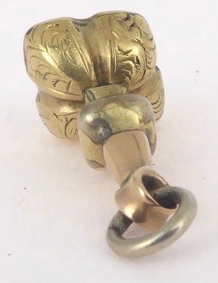 Lot 813 - A 19th century gold-coloured fob seal with an intaglio green stone