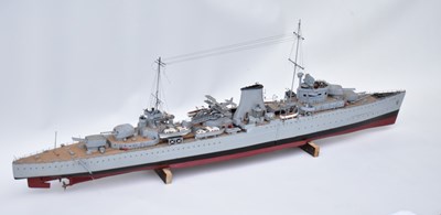 Lot 405 - A Naval model battleship with gun turrets,...