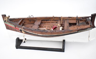 Lot 239 - KENYA; a wooden model of a fishing row boat,...