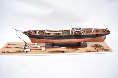 Lot 258 - A wooden model of a steam cruiser on a stand,...