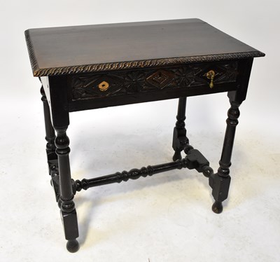 Lot 78 - A Georgian oak side table with carved frieze...