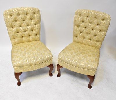 Lot 67 - A set of four button back upholstered...