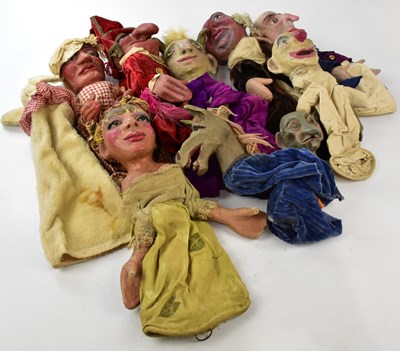 Lot 1385 - A collection of eight papier-mâché puppets...