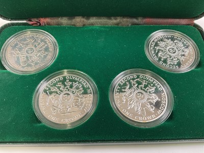 Lot 1398 - A set of four silver proof 1980 Olympic crowns...