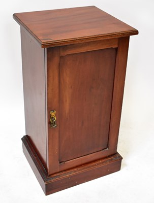 Lot 23 - A Victorian mahogany pot cupboard on plinth...