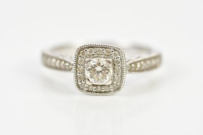 Lot 47 - An 18ct white gold diamond set ring with...