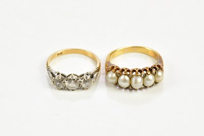 Lot 190 - A 9ct gold three stone dress ring, size L,...