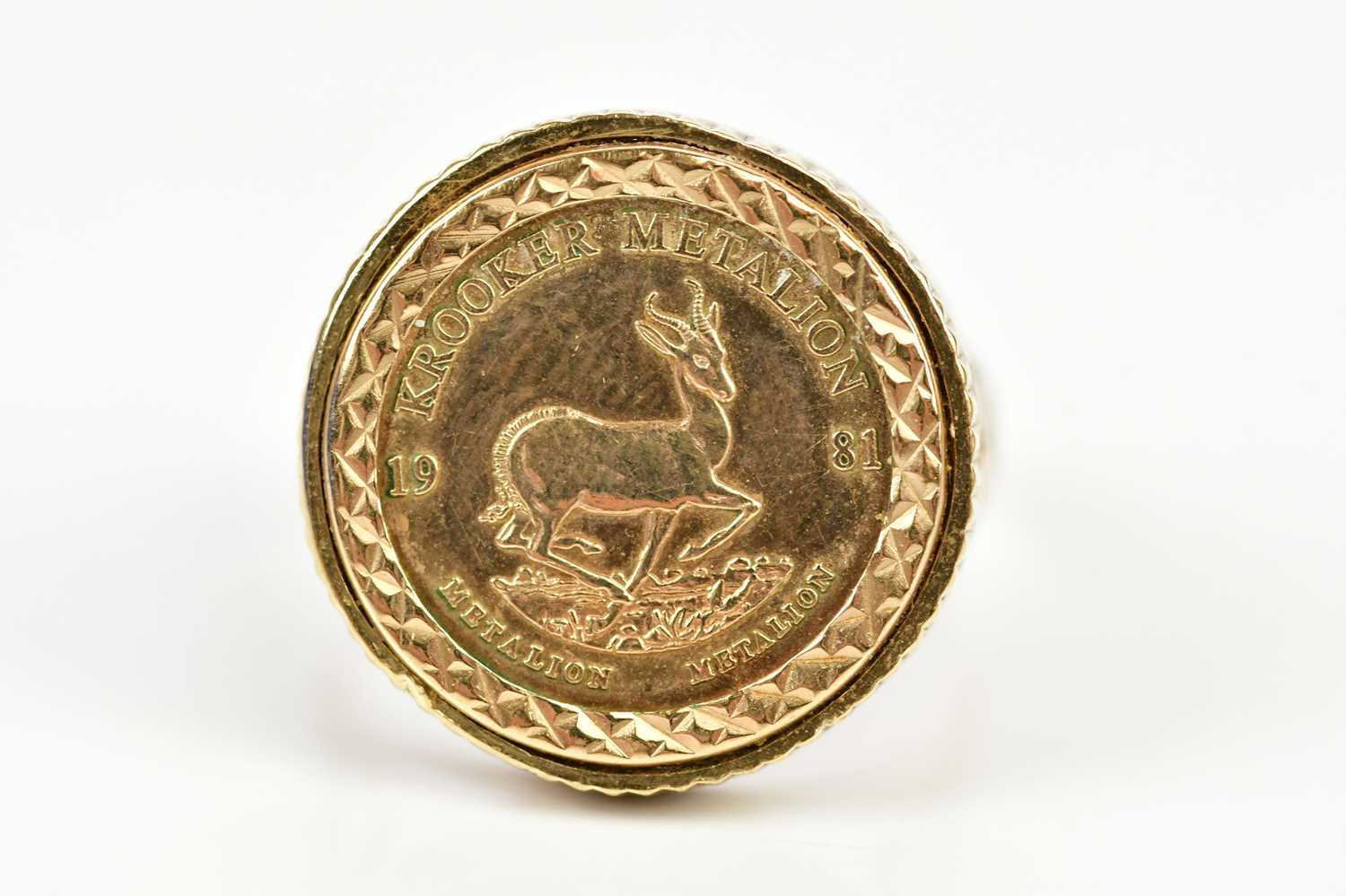 Lot 99 - A 9ct gold ring set with a 1981 Krooker