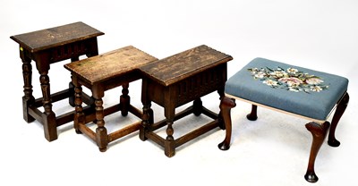 Lot 22 - Three reproduction oak stools with shaped plank tops