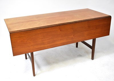 Lot 25 - A mid-20th century teak dining table with...