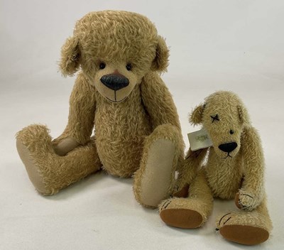 Lot 137 - A large gold plush teddy bear with weighted...