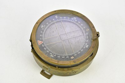 Lot 1399 - An early 20th century brass marine compass...