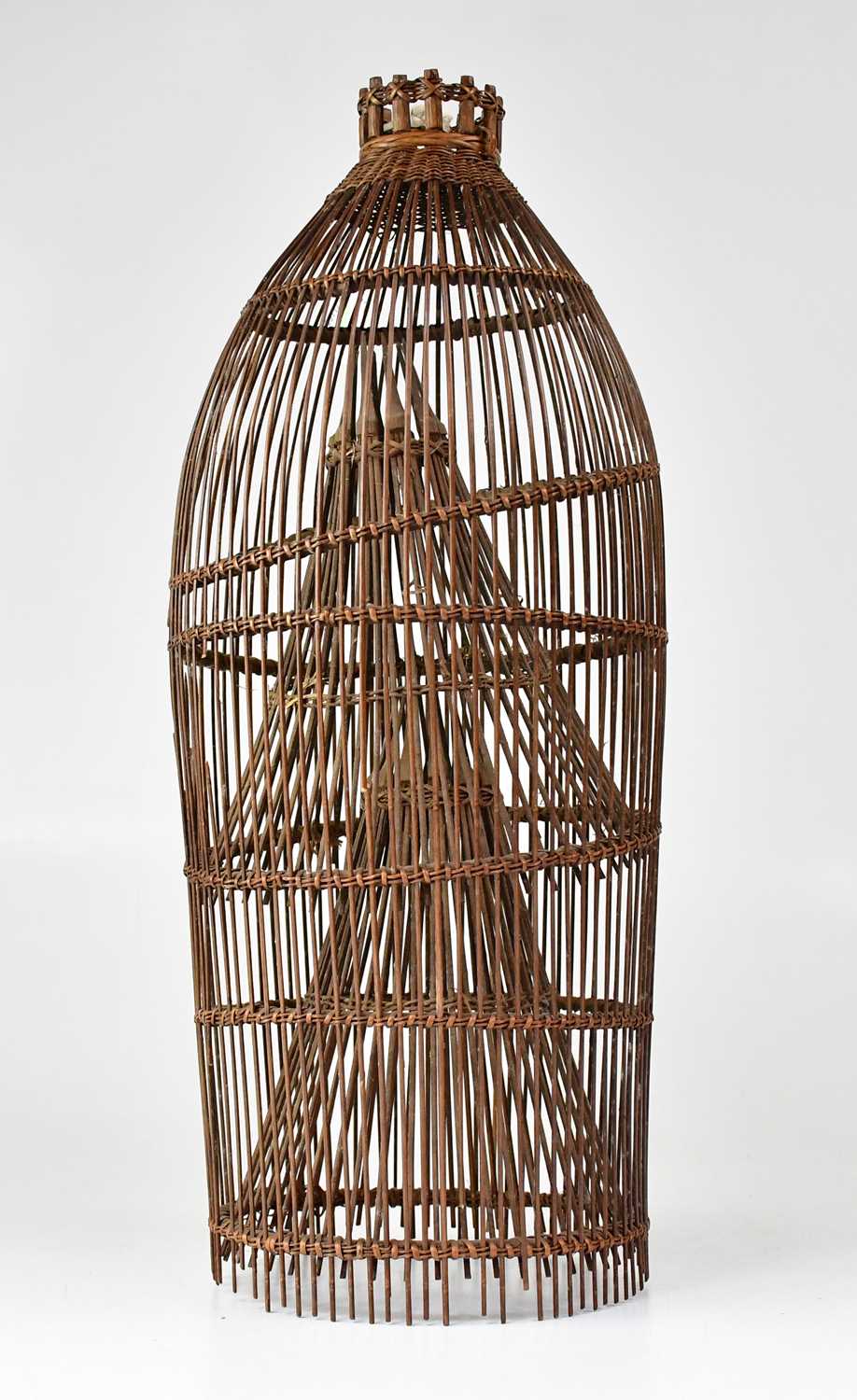 Lot 587 - A vintage Thai woven rattan fish trap, height...