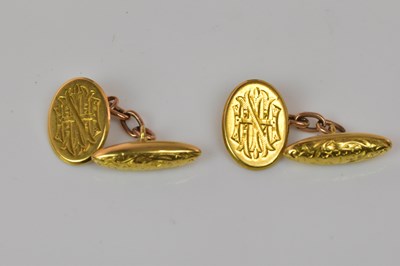 Lot 1251 - A pair of 18ct yellow gold cufflinks with...