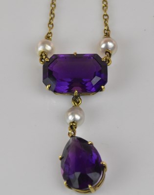 Lot 1253 - An Edwardian yellow metal amethyst and pearl...