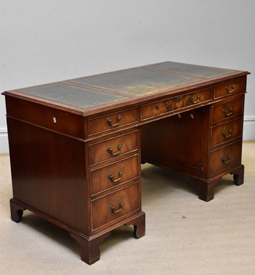 Lot 1179 - A reproduction mahogany knee-hole pedestal...